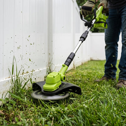 Trimming at the base of the fence, wheels off